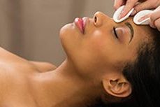 Close up of a African woman getting a Vi Derm peel.