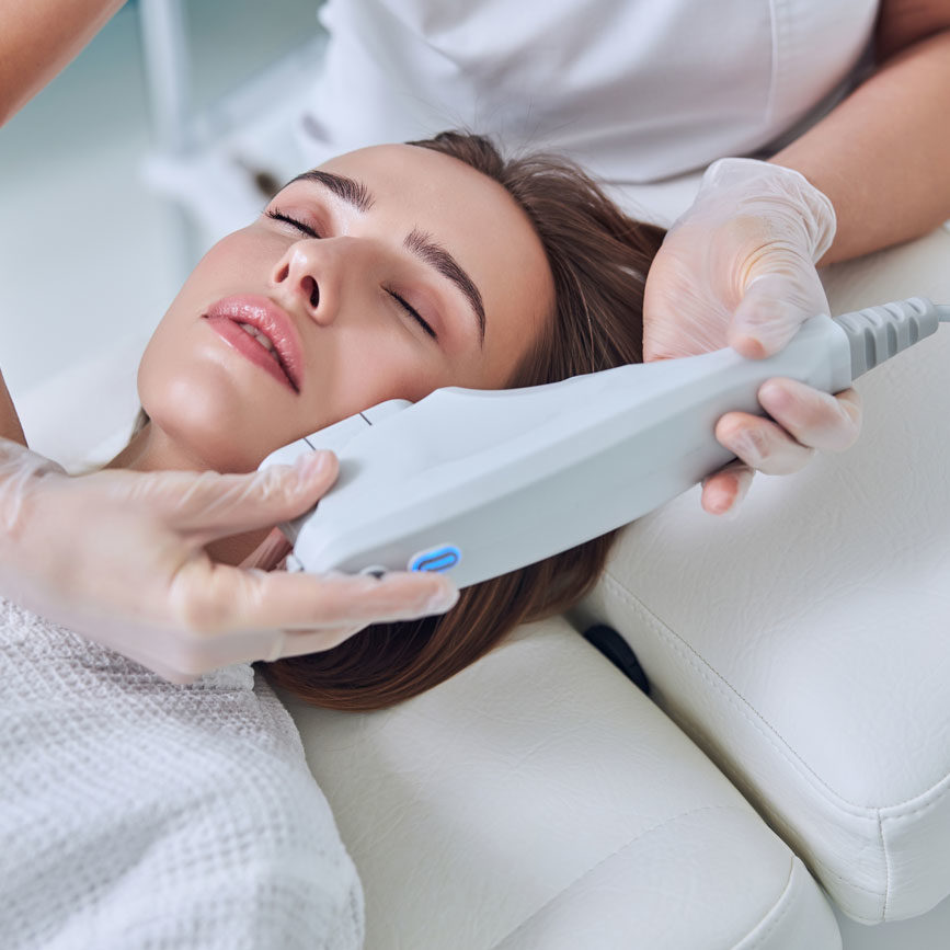 Woman receiving a non surgical face lift.