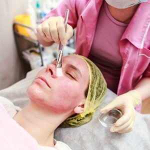 Lady getting a chemical peel from Deja Vu Med Spa and Salon.