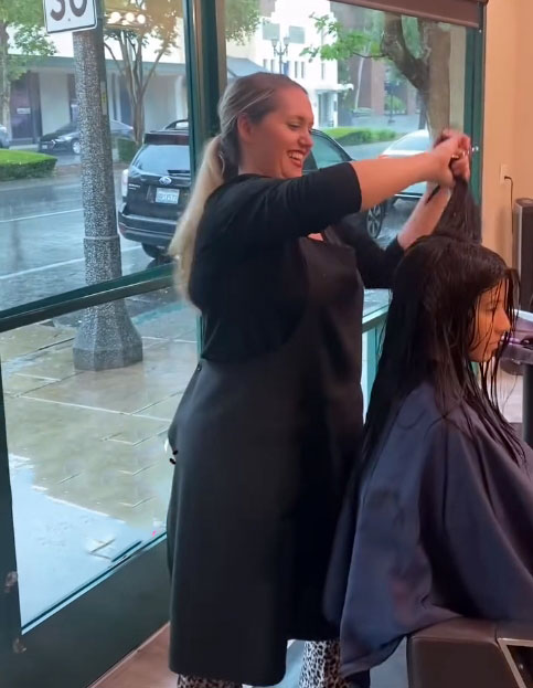 Julianne Lyle Aragon cutting hair owner of Deja Vu Med Spa and Salon in Downtown Arcadia, CA